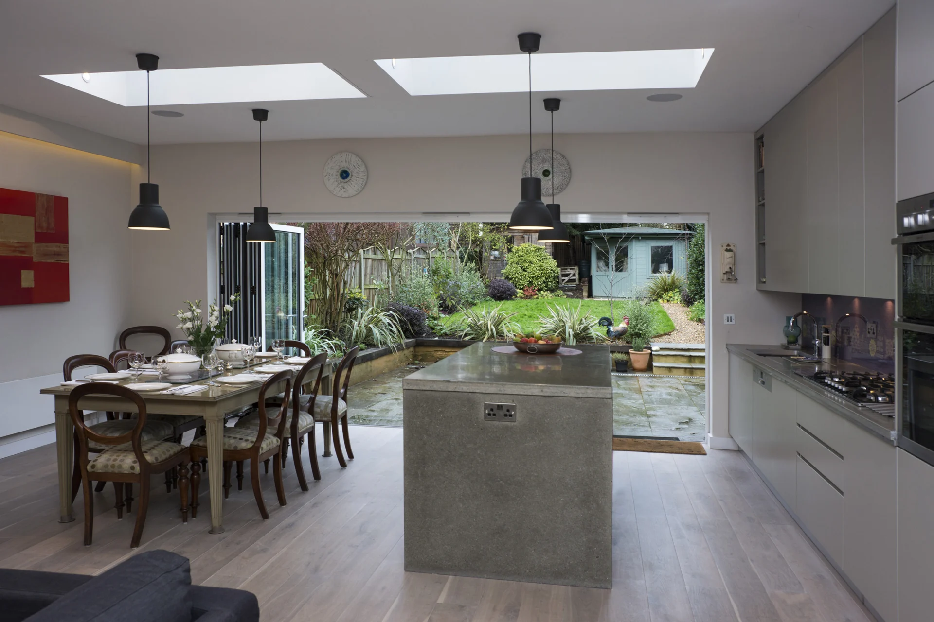 Swains Lane kitchen with island and garden view