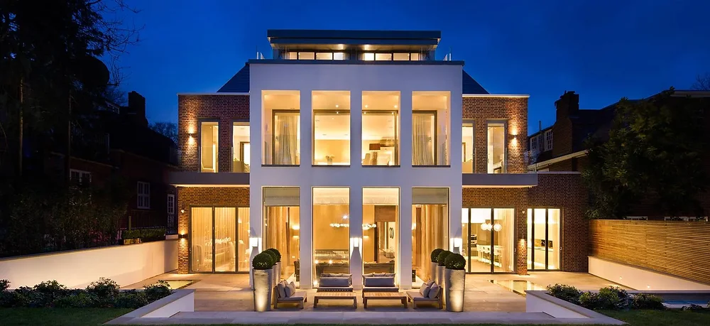 Contemporary house illuminated at dusk